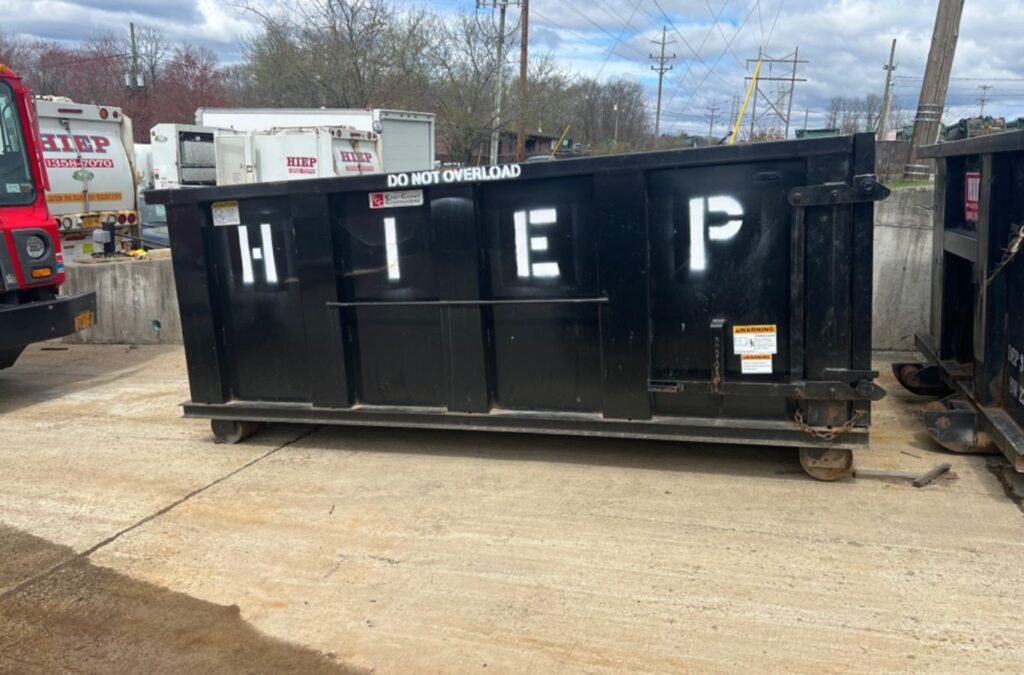 A Hiep Sanitation expert providing construction dumpster rental in Nyack, NY, showing why we are the best choice. Construction Dumpster Rental near me.