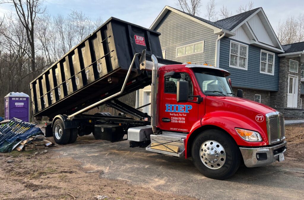Hiep Sanitation crew delivering roll-off dumpster rental in Mount Vernon, NY using professional equipment and local expertise to support safe, efficient debris removal.