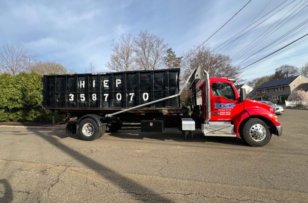 A Hiep Sanitation expert performing trash pickup in Fort Lee, NJ demonstrating quality, efficiency, and local reliability. Trash Services near me.